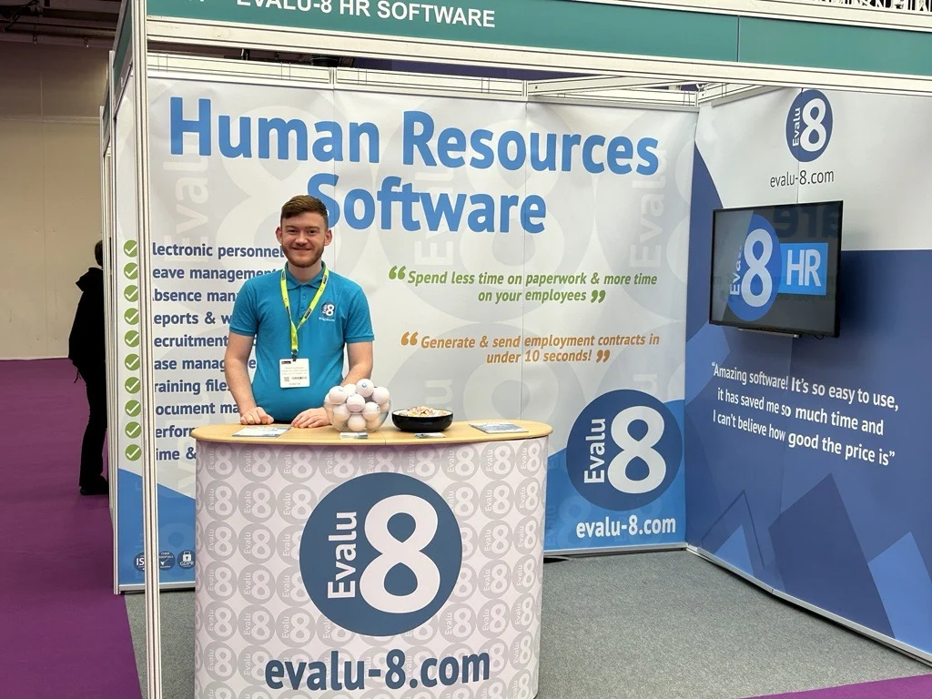 Evalu-8 team member at the Evalu-8 HR Software exhibition stand