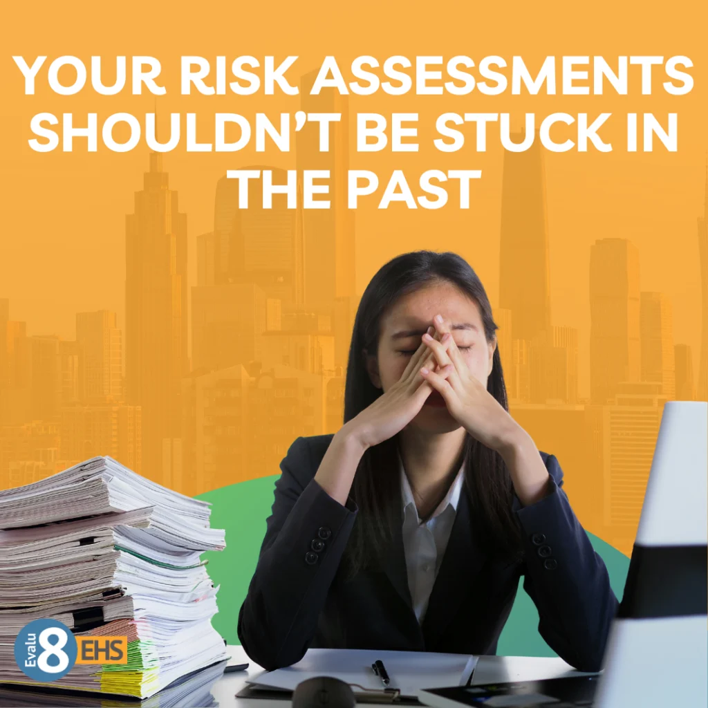 Stressed woman behind stacks of paper: your risk assessments shouldn't be stuck in the past