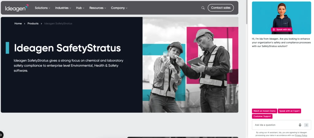 Ideagen SafetyStratus product page showing workers in hard hats and hi-vis reviewing a tablet